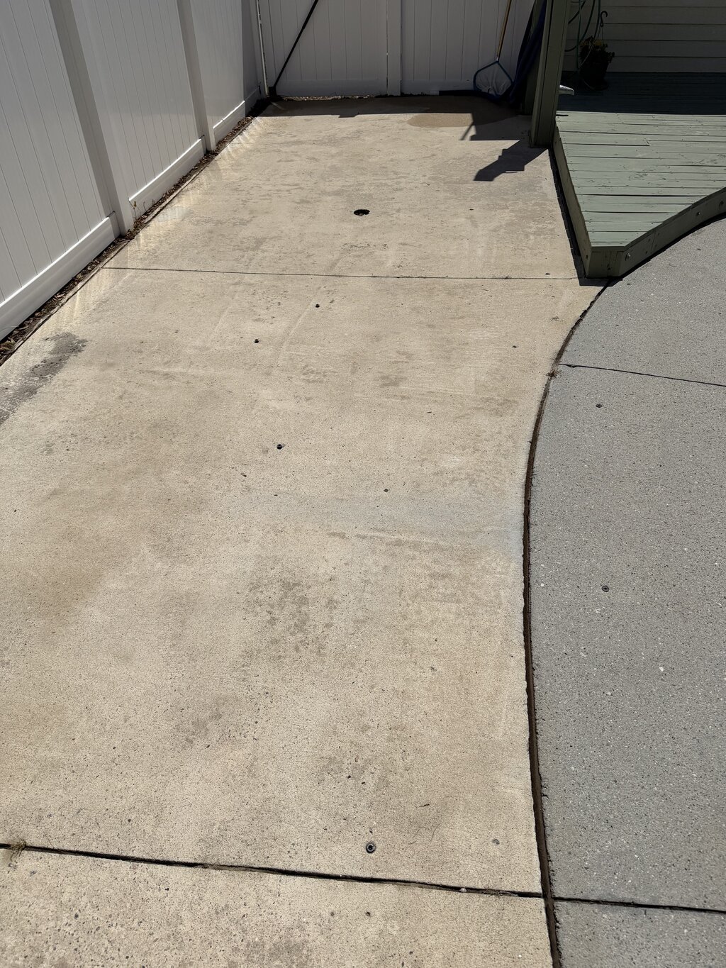 Concrete surface after soft washing — bright and clean
