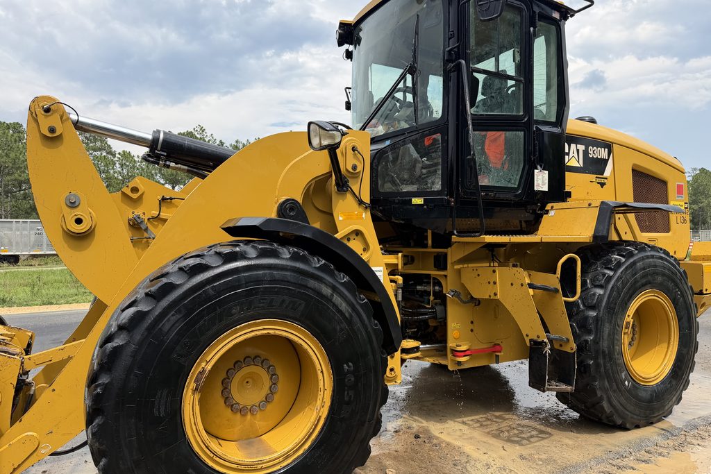 CAT wheel loader after washing — clean, restored finish