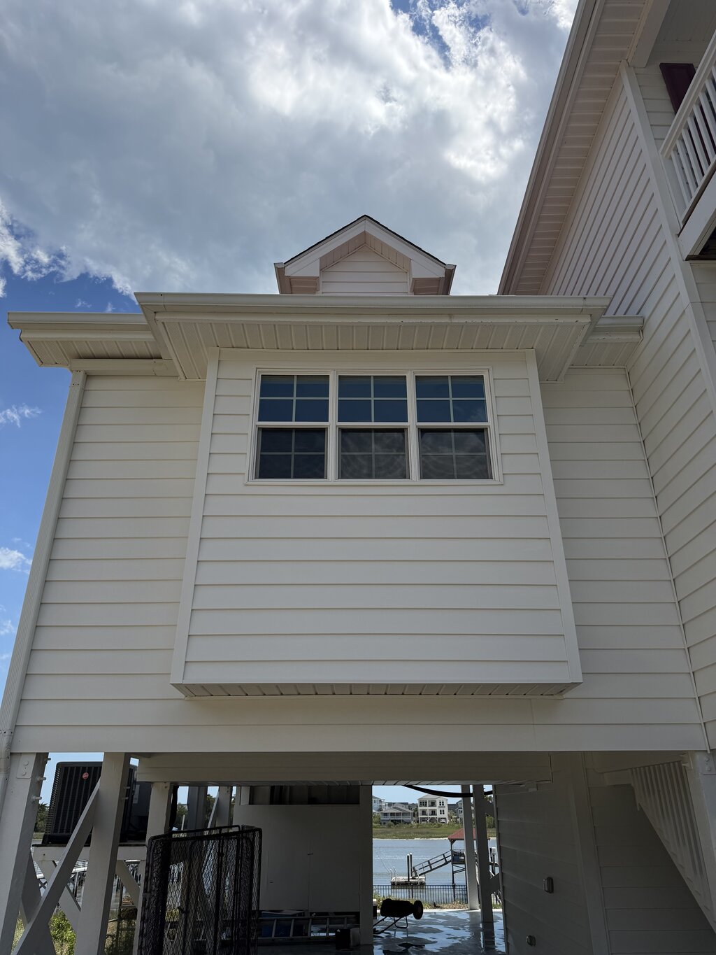 House siding after soft washing — mildew gone, color restored