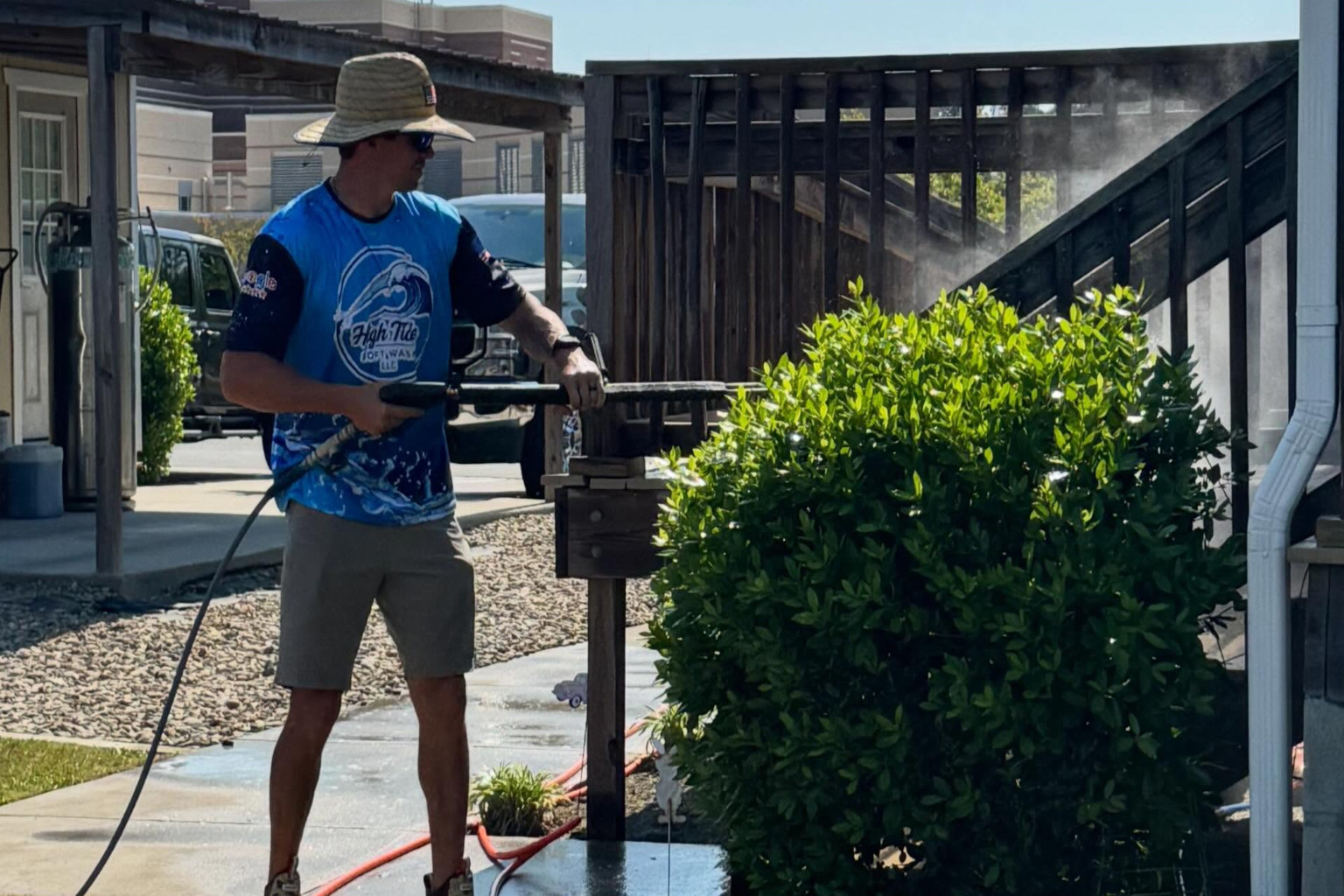 Josh soft washing a property in Brunswick County, NC